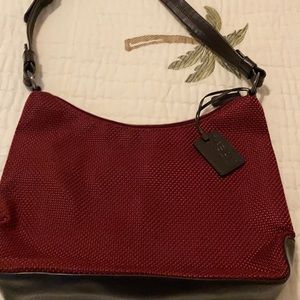 The Sak burgundy handbag